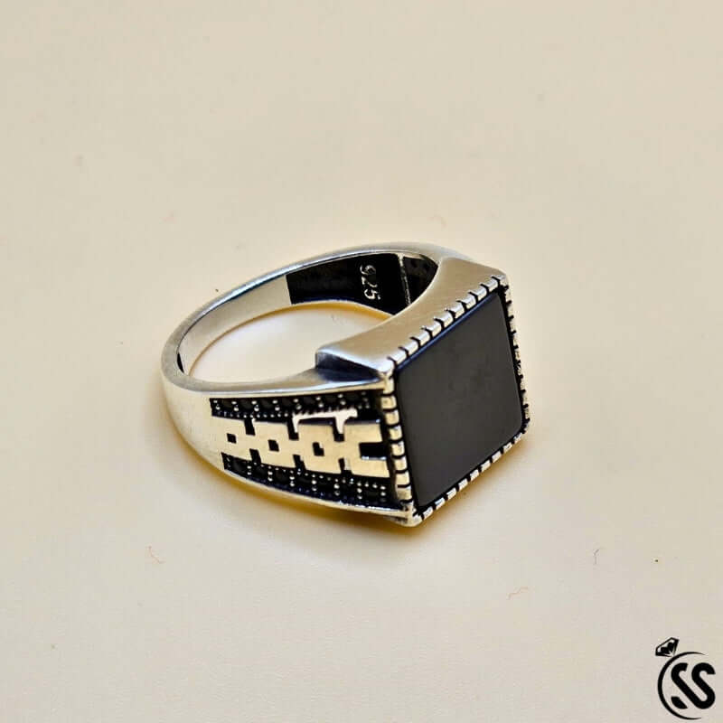 Vintage Turkish 925 sterling silver gents ring featuring a square black stone and intricate design.
