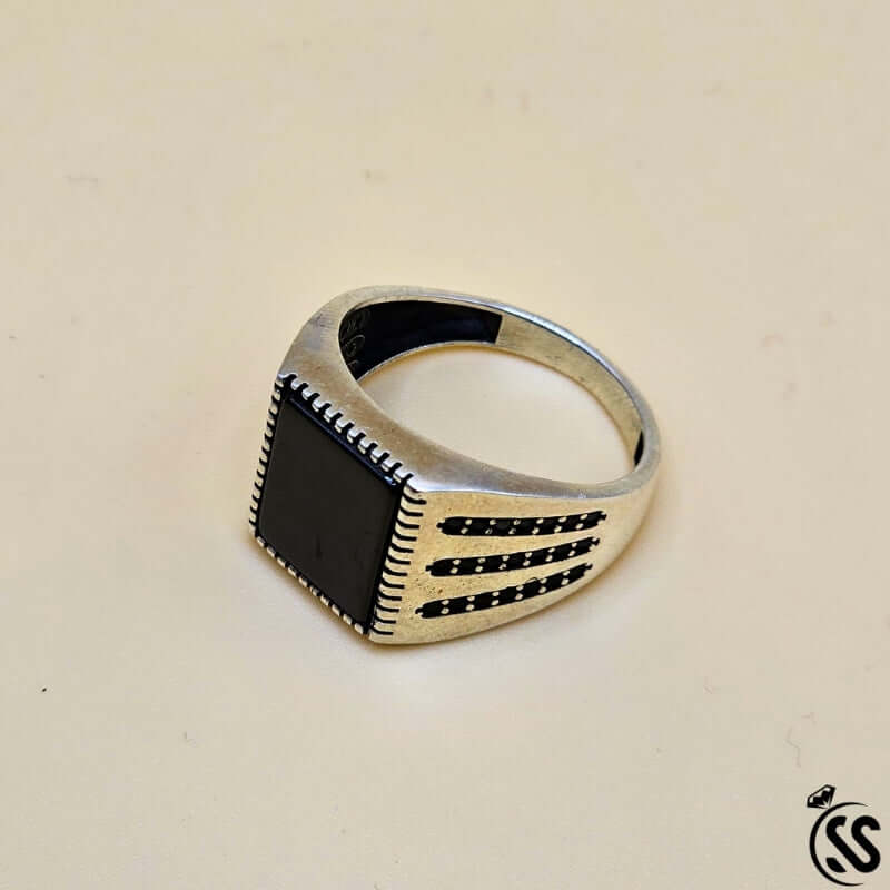 Vintage Turkish 925 sterling silver gents ring with black stone, showcasing intricate Ottoman-inspired design.
