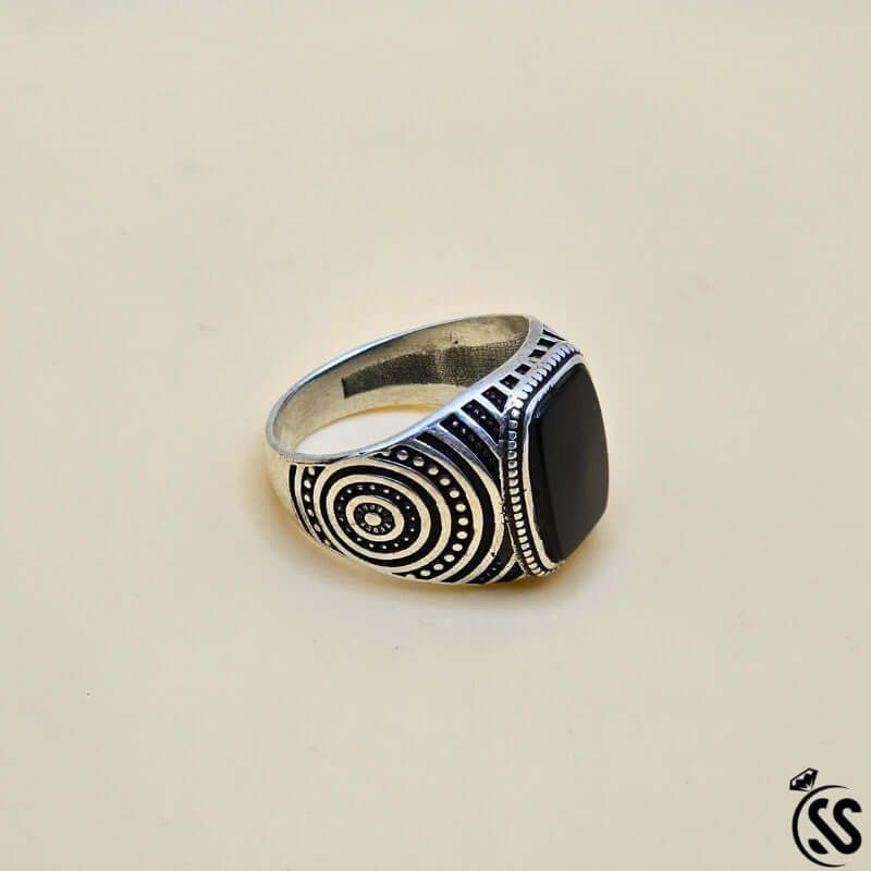 Vintage Turkish 925 sterling silver gents ring with bold design and black stone, exemplifying Ottoman craftsmanship.