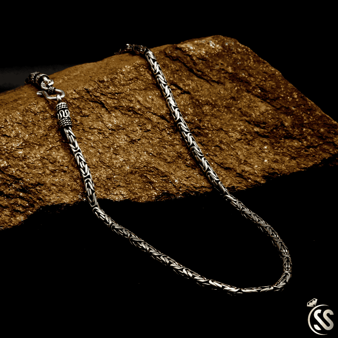 Vintage Turkish Silver 925 chain for men, 22 inches long, 4mm wide, showcasing intricate design on a stone background.