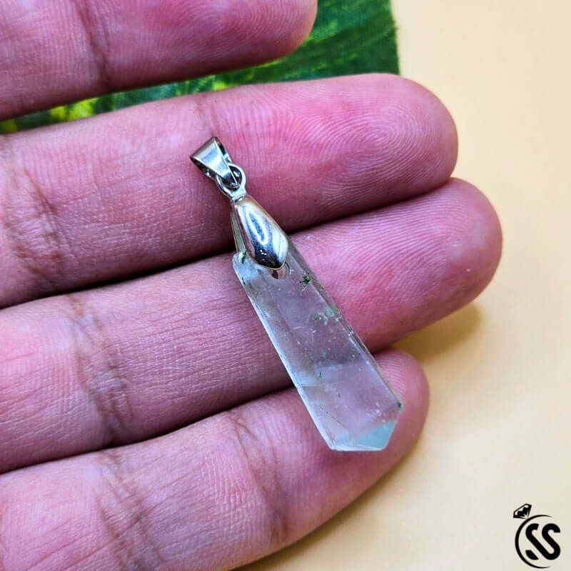 Handcrafted Fluorite real stone pendant showcasing clarity and beauty, ideal for energy balance and mental focus.