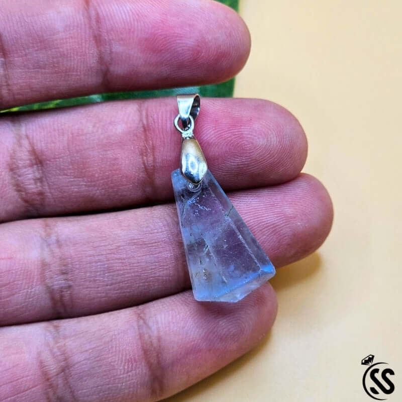 Fluorite real stone pendant showcasing calming colors, promoting clarity, focus, and emotional stability.