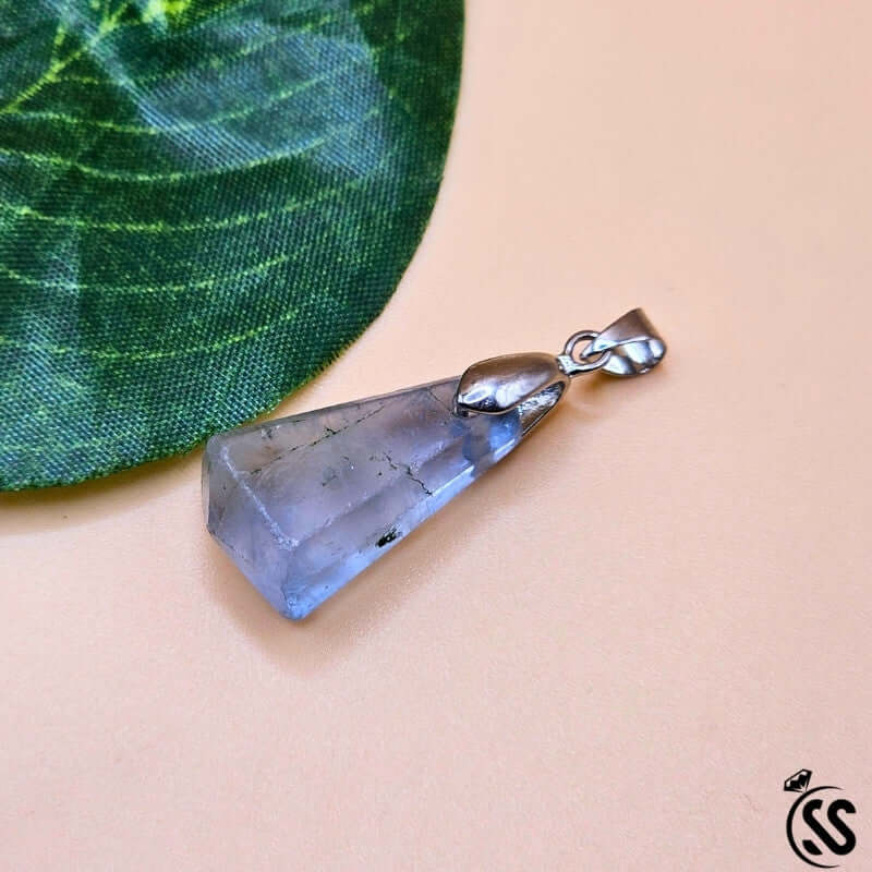 Fluorite real stone pendant with silver accents, promoting clarity and protection against negative energy.