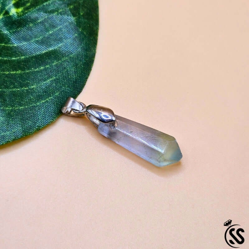 Fluorite real stone pendant showcasing calming colors for clarity, focus, and protection, handcrafted from natural Fluorite.