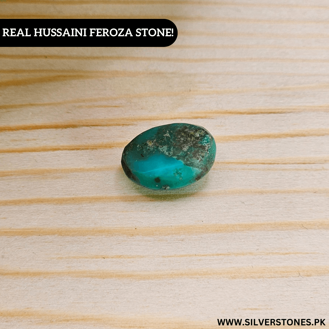 Authentic Shajri Hussaini Feroza stone in oval shape showcasing its unique turquoise color and natural veining.
