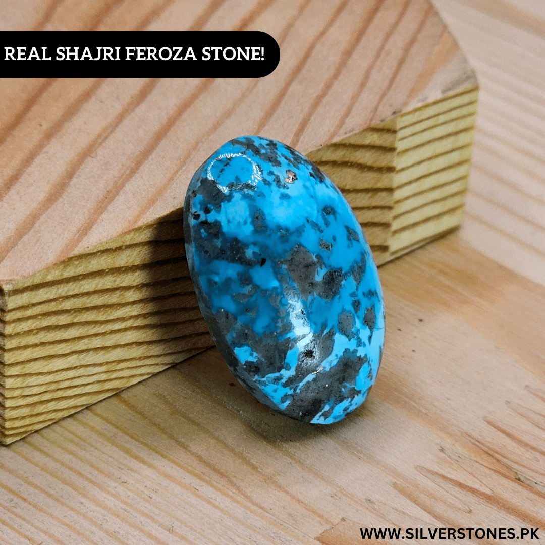 Real Shajri Irani Feroza stone in oval shape, showcasing vibrant turquoise color with natural patterns.