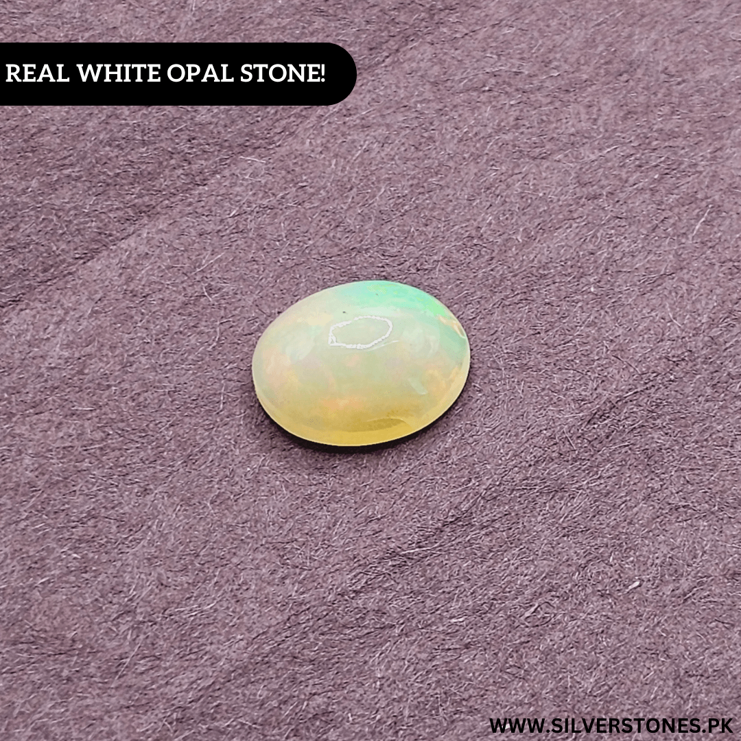 Real white Ethiopian opal stone in oval shape, showcasing vibrant play-of-color and natural glow on a textured background.