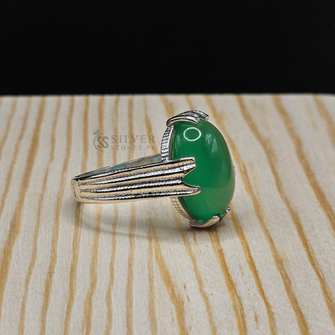 Handmade Real Aqeeq Silver (Chandi) Ring showcasing a vibrant green Aqeeq stone, symbolizing strength and protection.