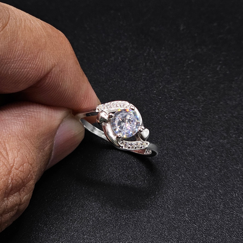 0.8 carat round moissanite ring with brilliant sparkle and elegant sterling silver setting
