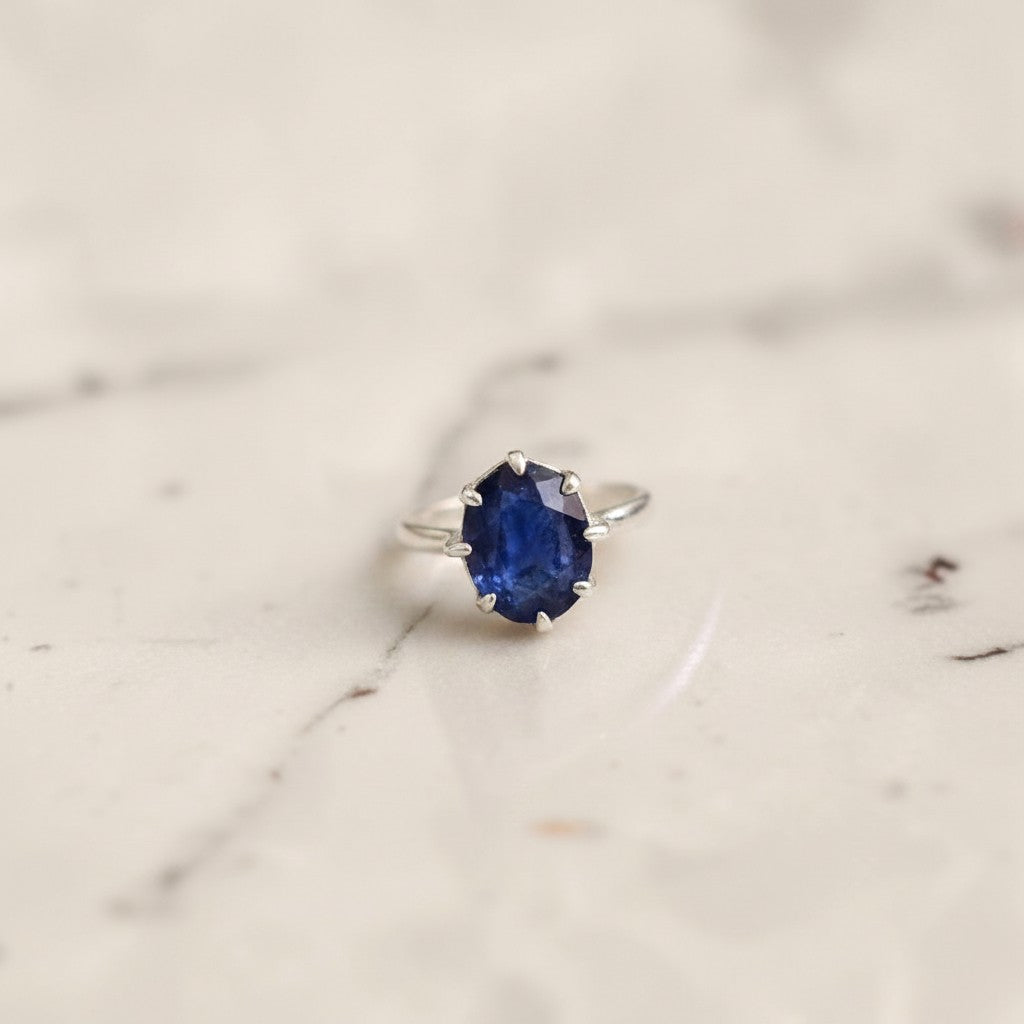 6 carat oval African blue sapphire close up deep vivid blue natural Neelam stone women ring Pakistan