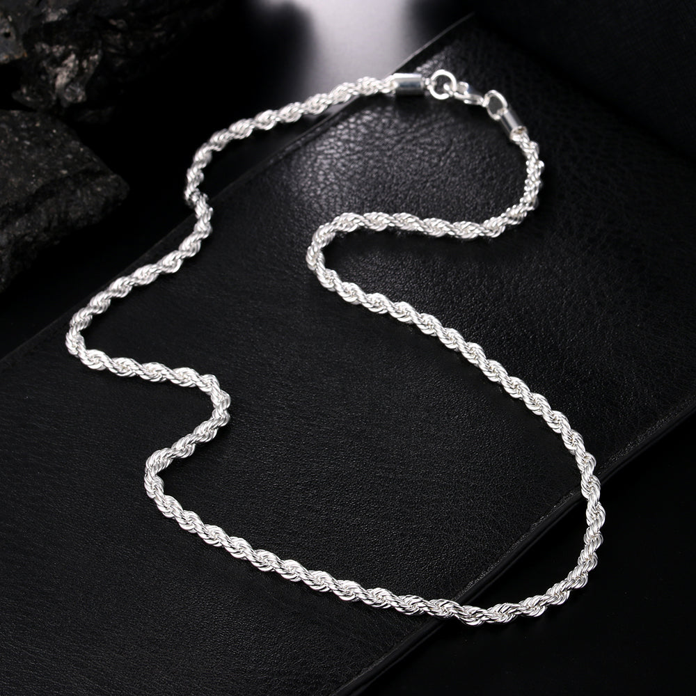 Authentic 22 inch Italian 925 silver rope chain for boys and men displayed on a jewelry cushion.