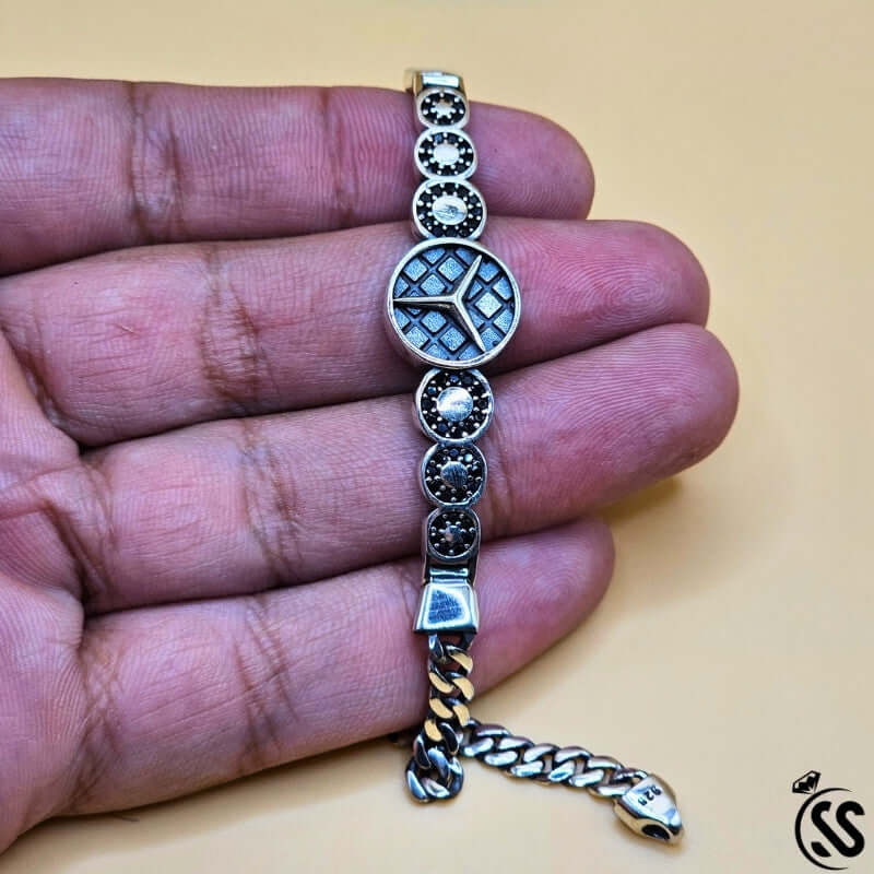 Turkish Silver 925 gents bracelet with Mercedes logo style and black zircons, showcasing modern elegance.