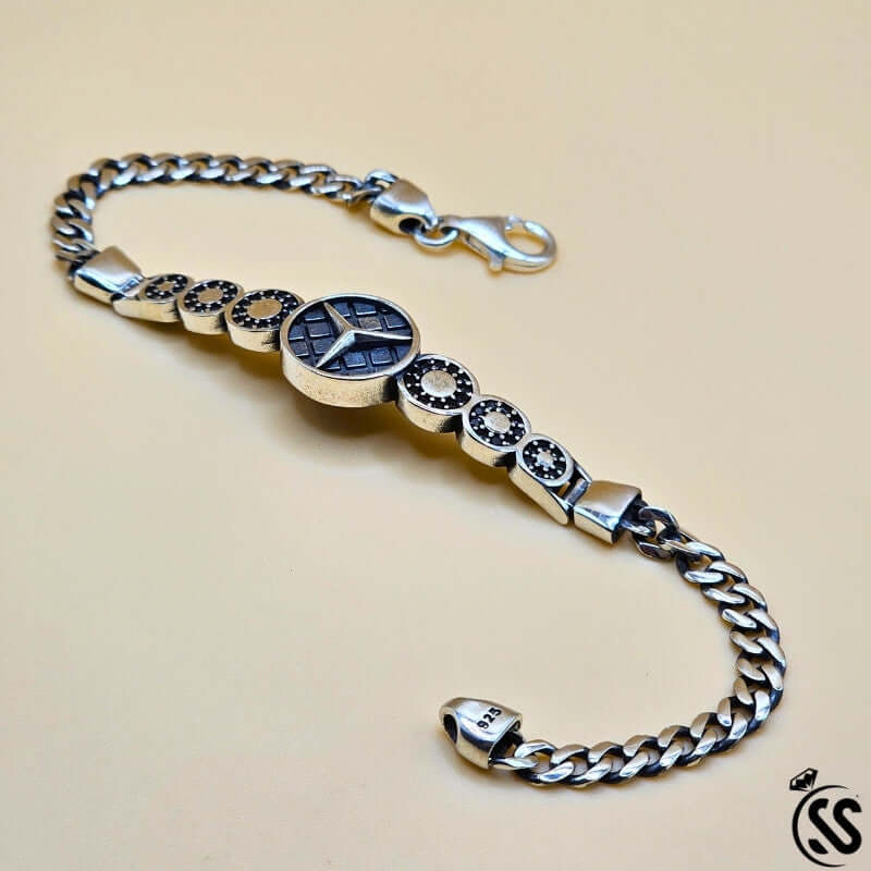 Turkish Silver 925 gents bracelet with Mercedes logo design and black zircons, showcasing sleek elegance and strength.