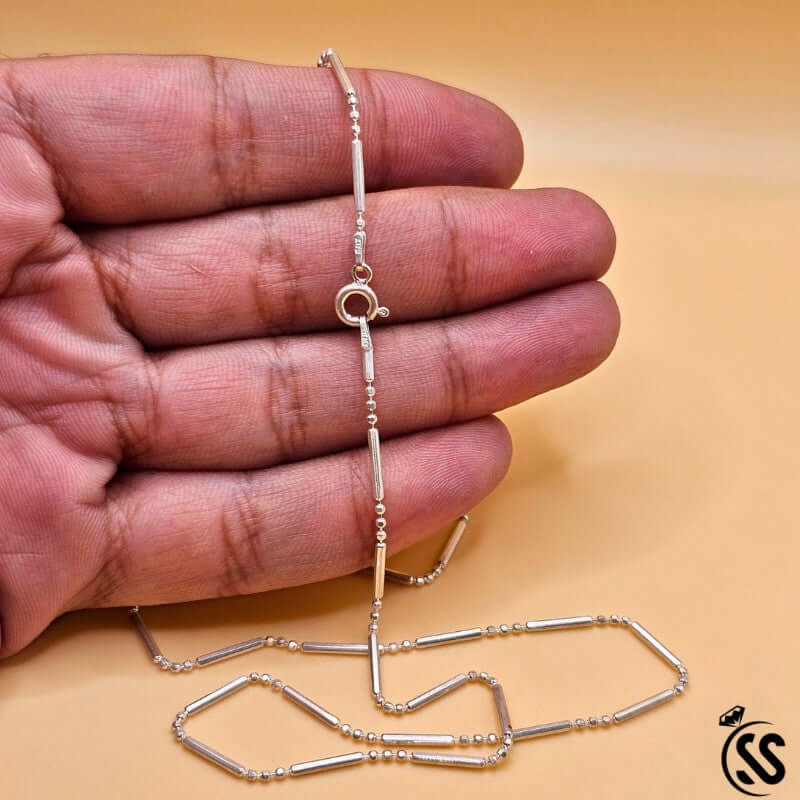 Close-up of Italian Sterling Silver Ladies Chain held in hand, showcasing its elegant design and durable craftsmanship.