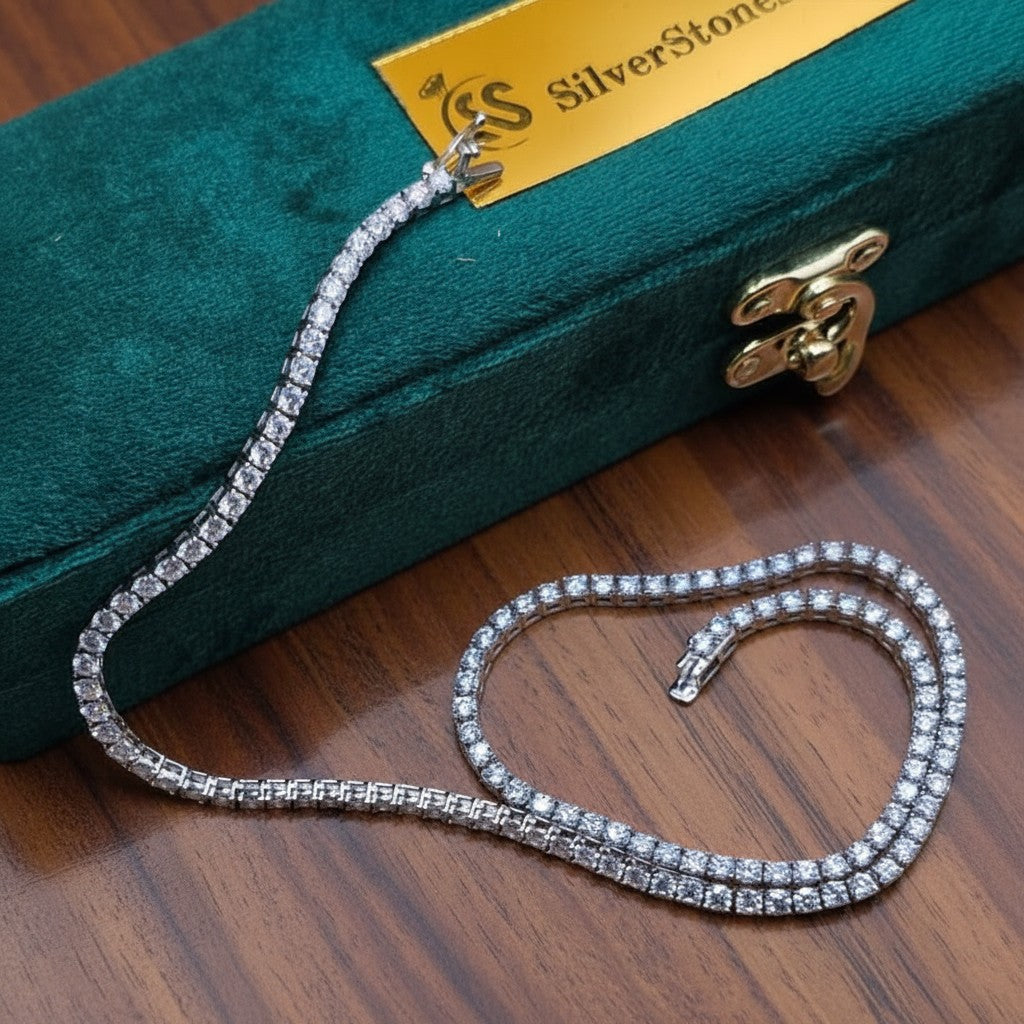 Close-up moissanite diamond chain jewelry photography.
