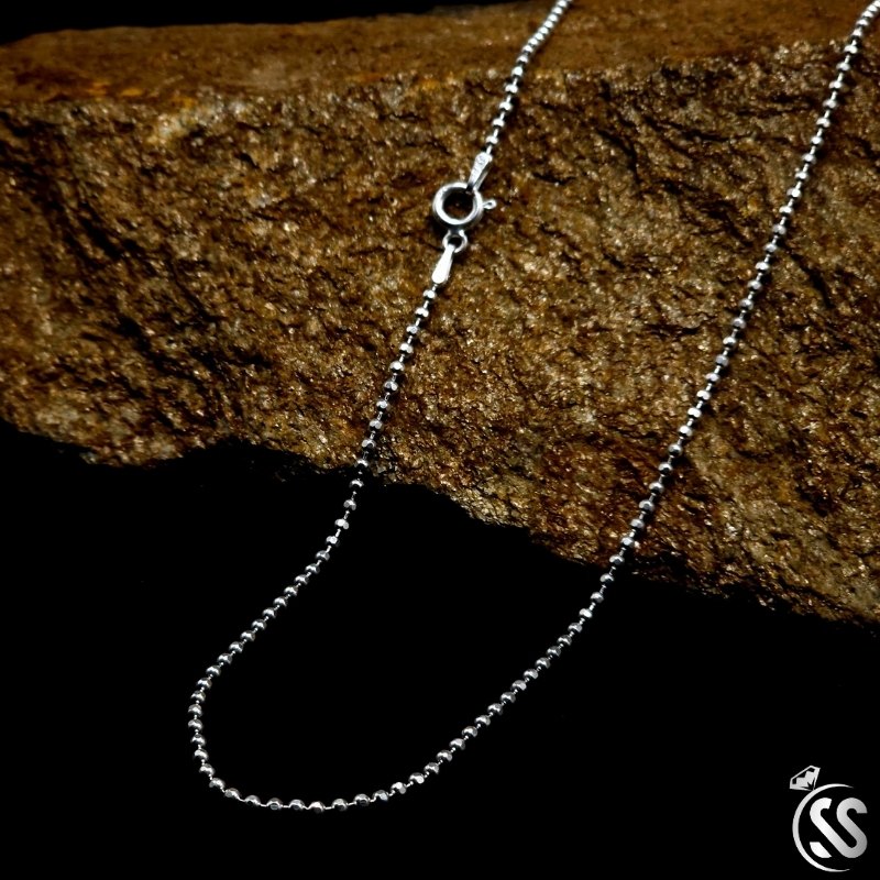 Italian Silver Sterling 925 ladies ball chain on a stone background, featuring 2mm width and 22 inches length.