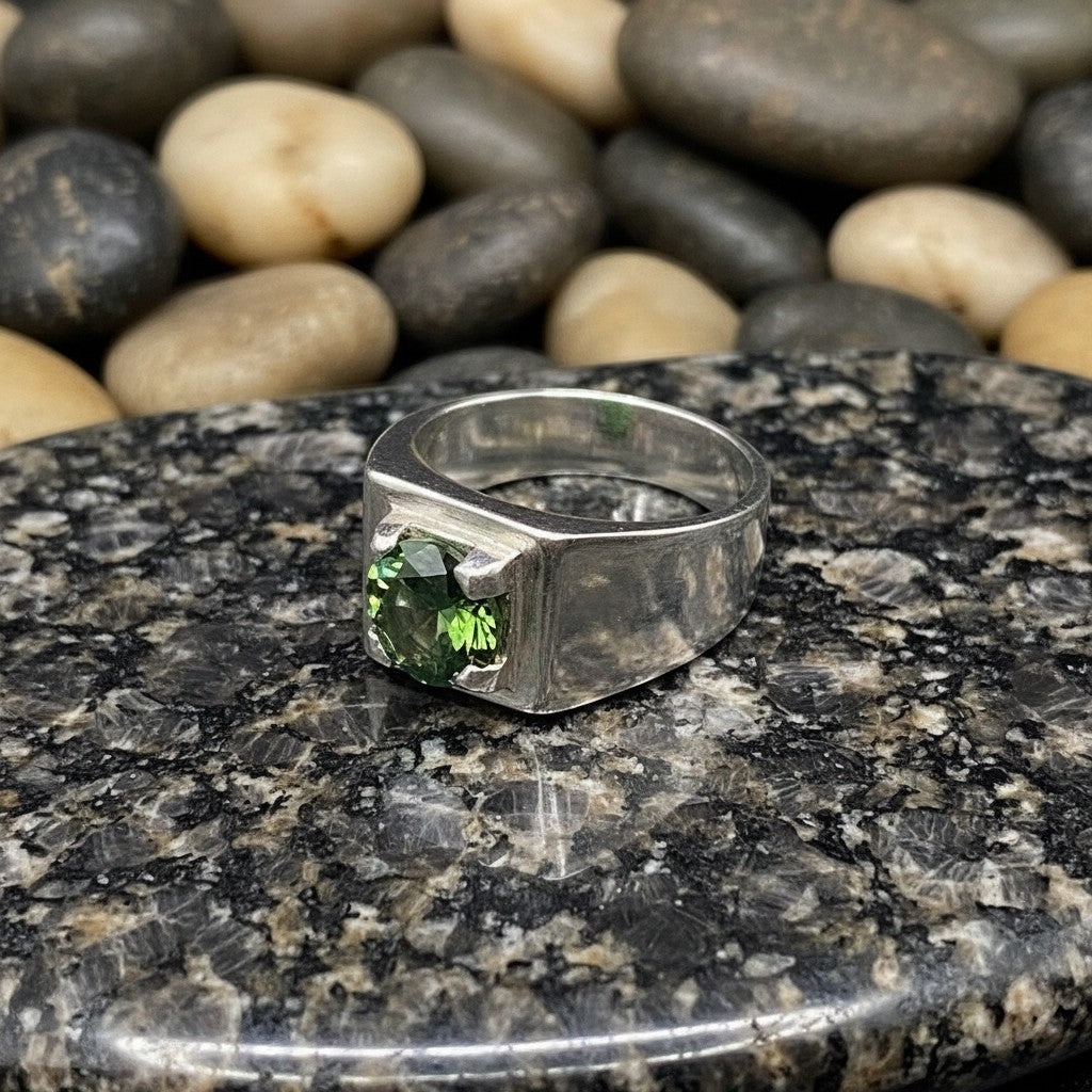 Luxury men's green moissanite diamond ring with GRA certificate and lab report on premium silver setting.