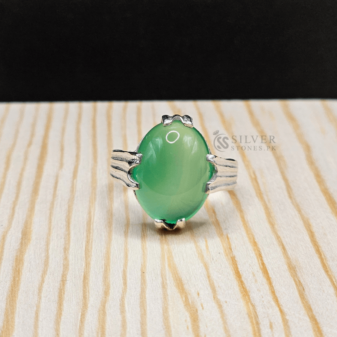 Handmade Real Aqeeq Silver (Chandi) Ring featuring a green oval gemstone, symbolizing strength and protection.