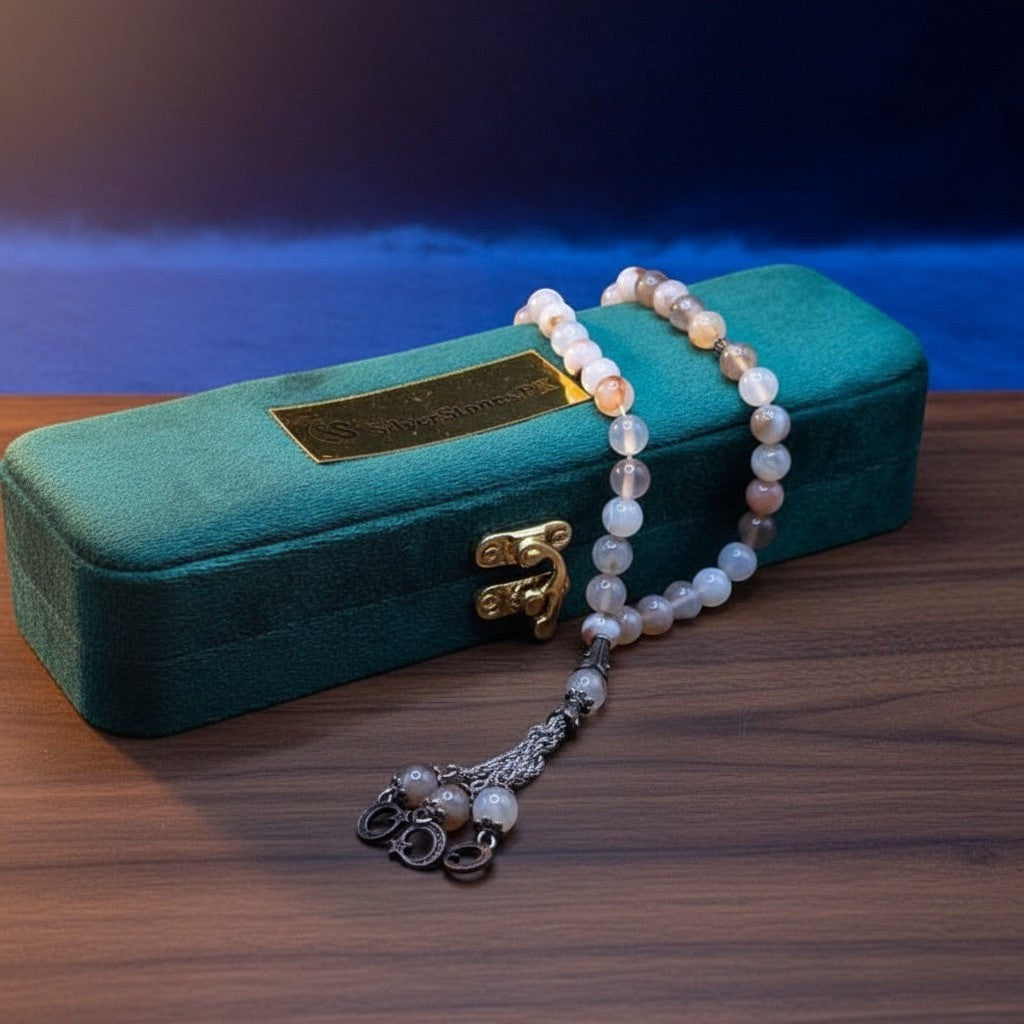 SilverStones.Pk real Shajri Aqeeq stones tasbeeh with polished, smooth, and rounded beads in white, grey, and brown tones.