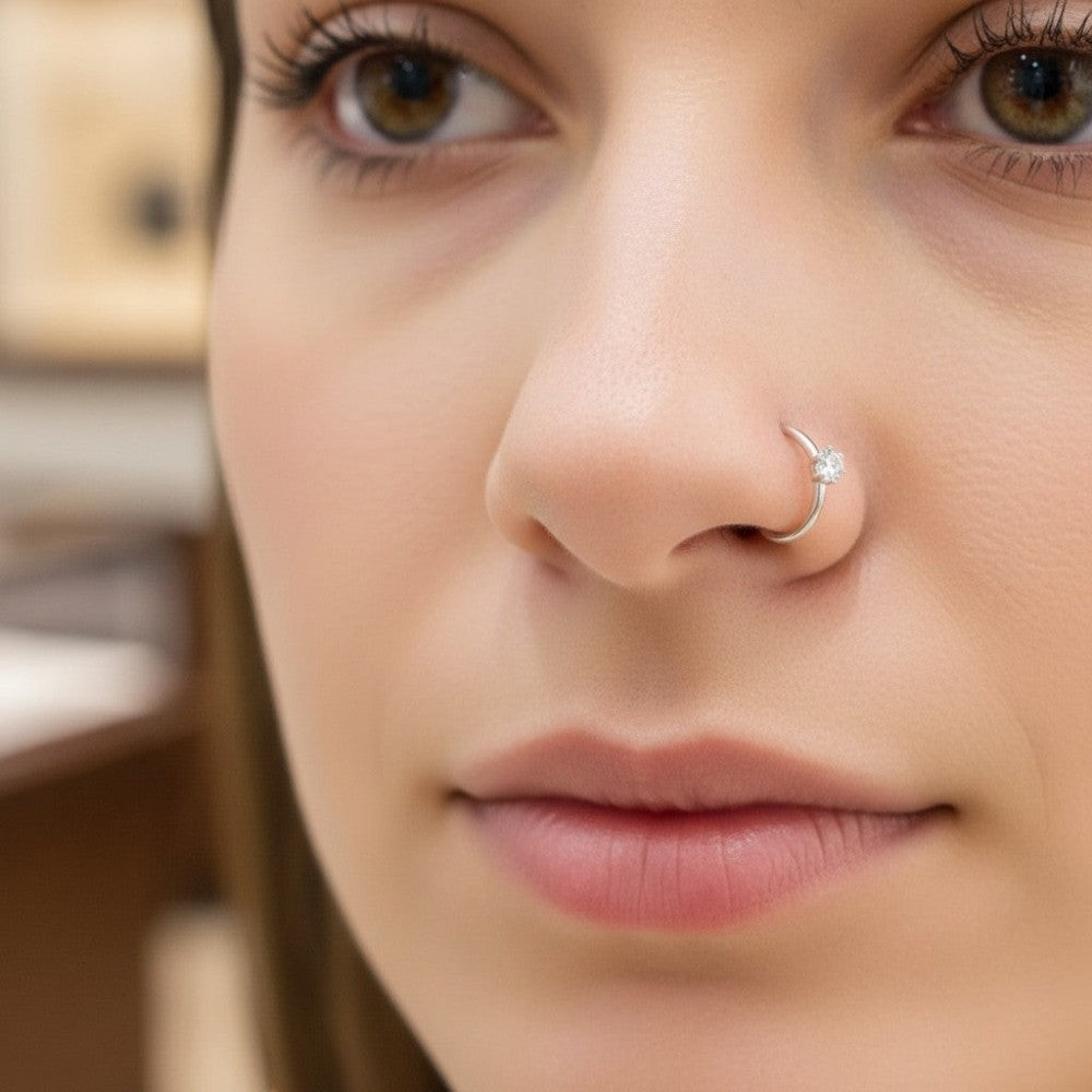 Woman wearing pure silver white zircon nose ring 10mm hoop Silverstones Pakistan