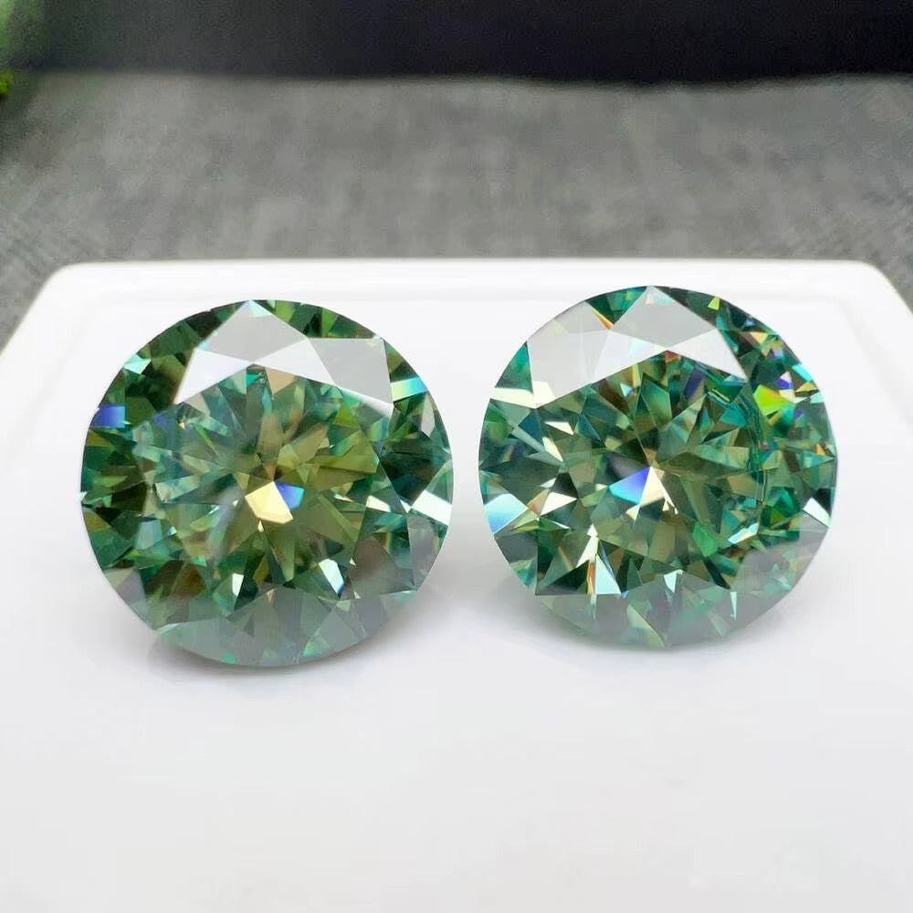 Two stunning Green Moissanite Diamonds showcasing exceptional brilliance and sparkle.