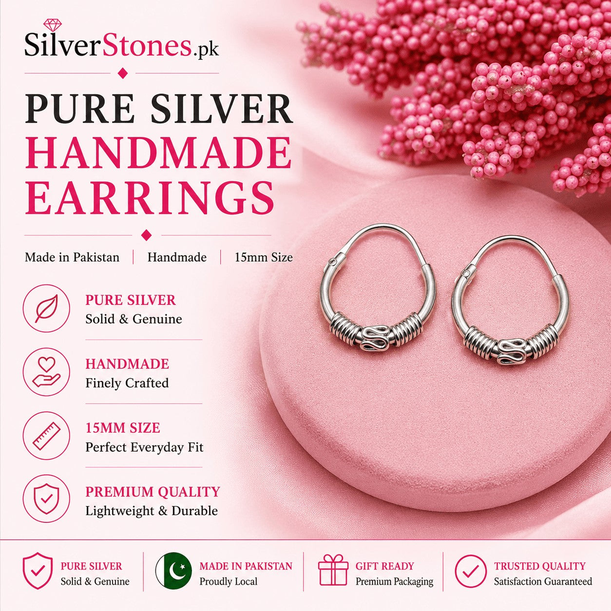 SilverStones.Pk handmade 15mm 925 silver hoop earrings with intricate coiled detailing on a pink display stand.