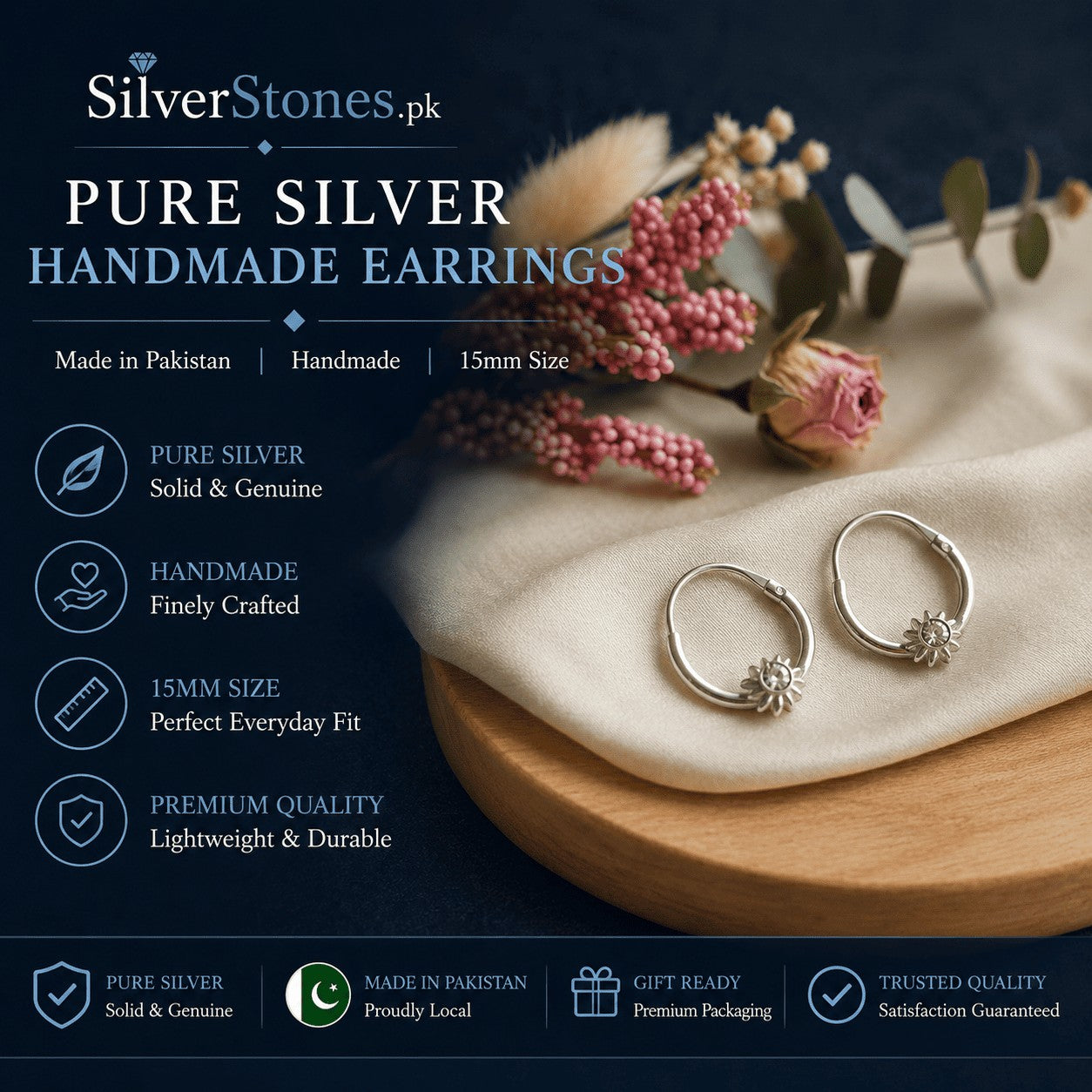 SilverStones.Pk handmade 925 silver hoop earrings with sunburst detail, 15mm size, displayed on a wooden base.