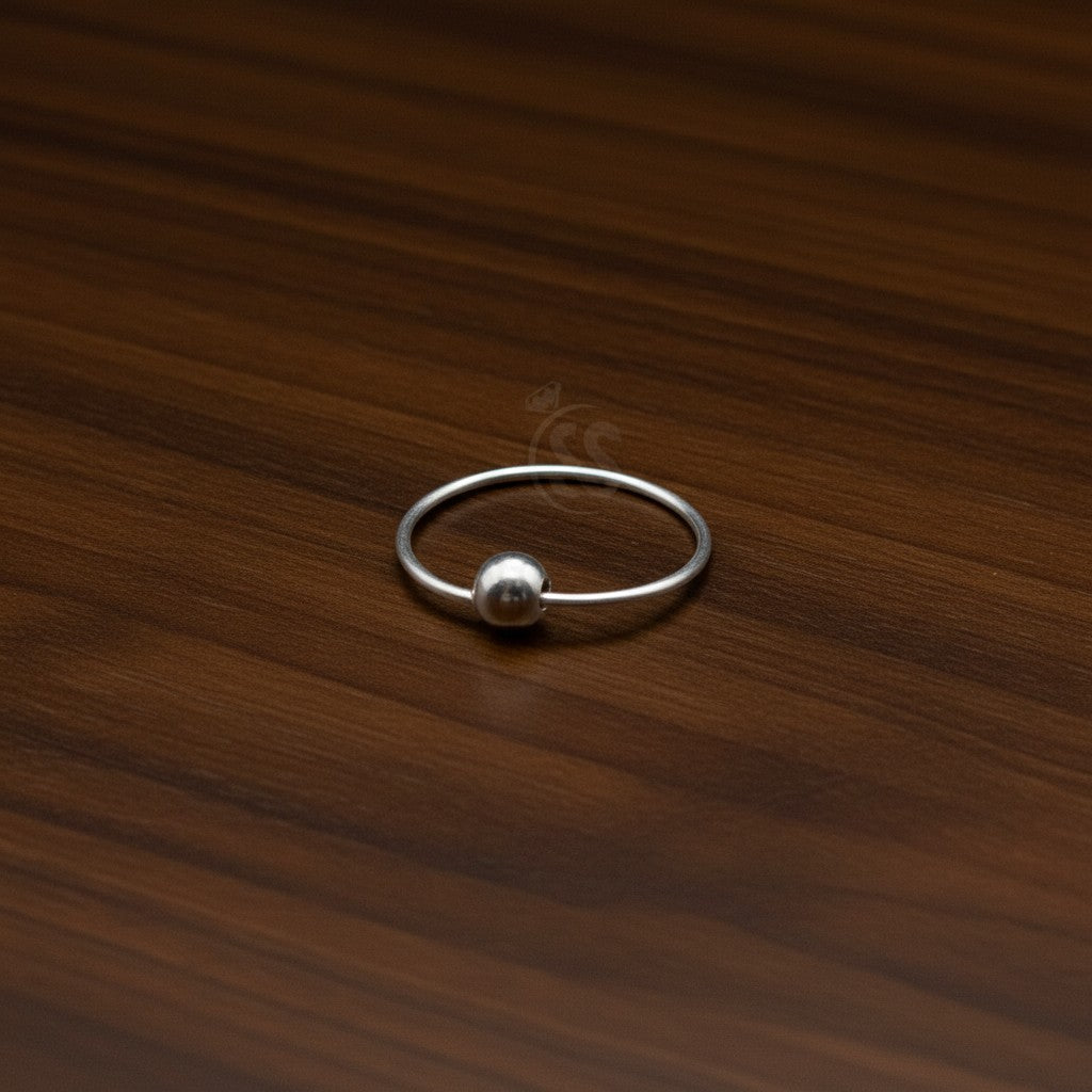 SilverStones.Pk 10mm genuine silver nose ring with a single bead accent, perfect for everyday wear.