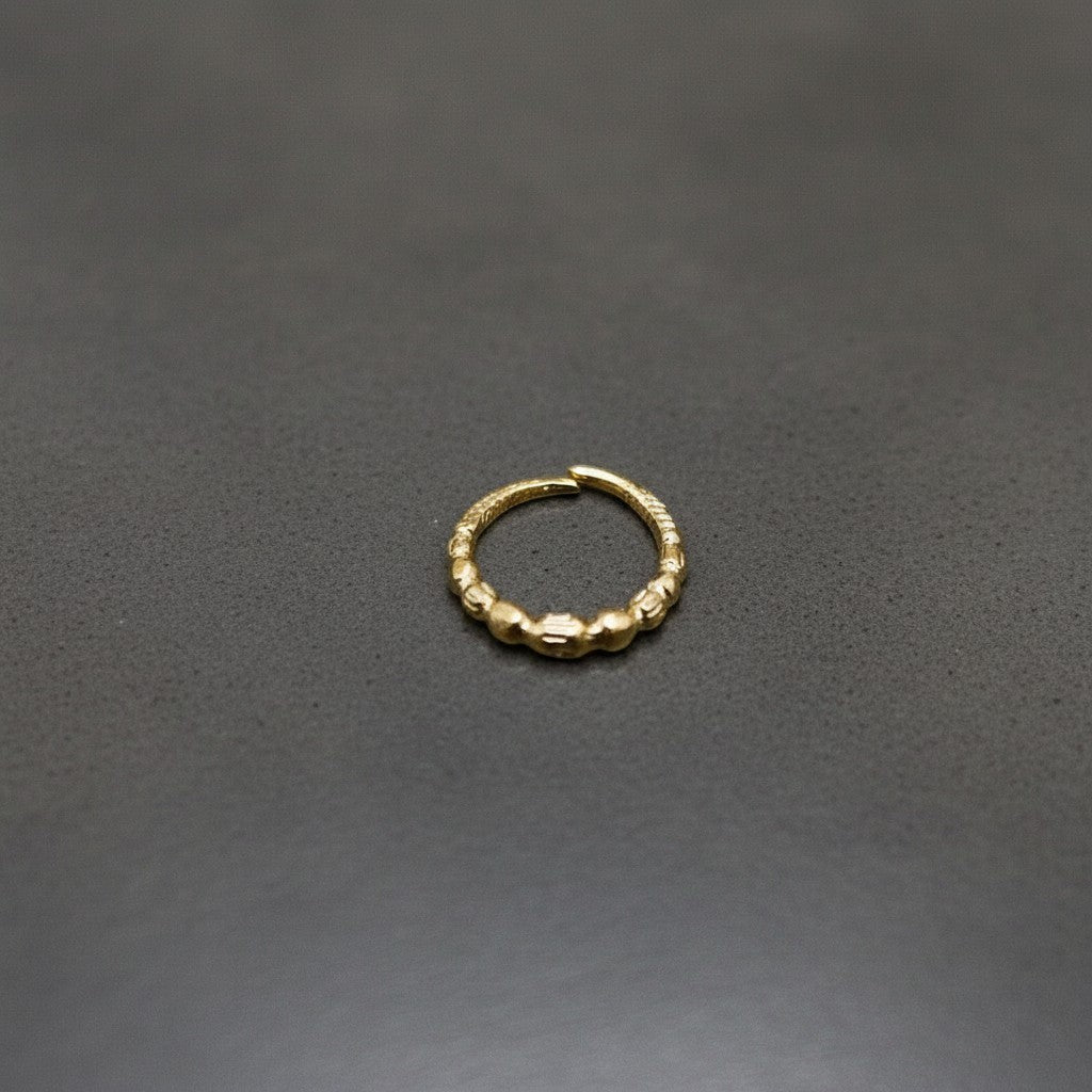 SilverStones.Pk 10mm 24k gold-plated sterling silver nose ring with textured design. Hypoallergenic.