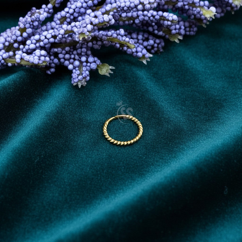 SilverStones.Pk 8mm twisted 24k gold plated sterling silver nose ring. Hypoallergenic and elegant.