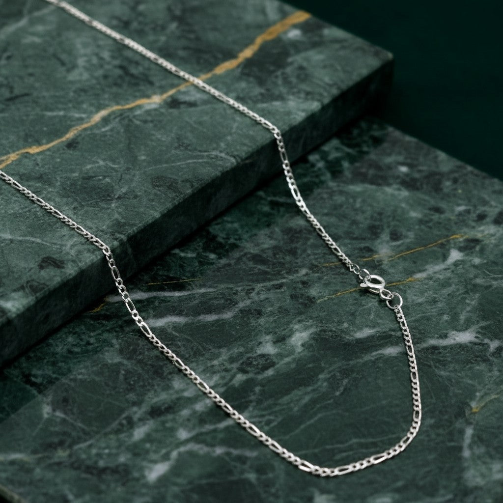 SilverStones.Pk 2mm Figaro chain necklace made of 925 sterling silver with a polished finish and lobster clasp.
