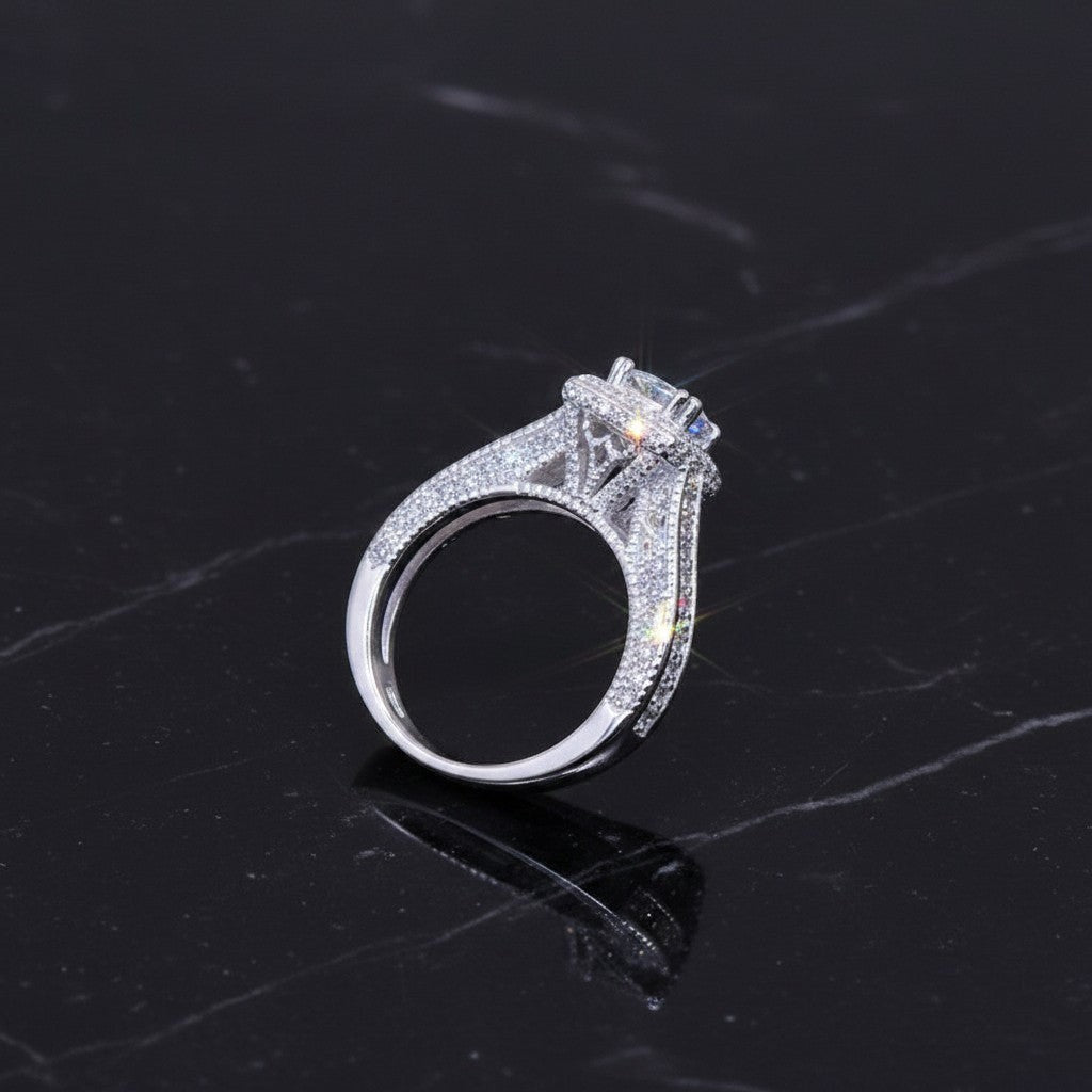 SilverStones.Pk 925 Italian sterling silver ladies ring with square-cut zircon center and pavé band.
