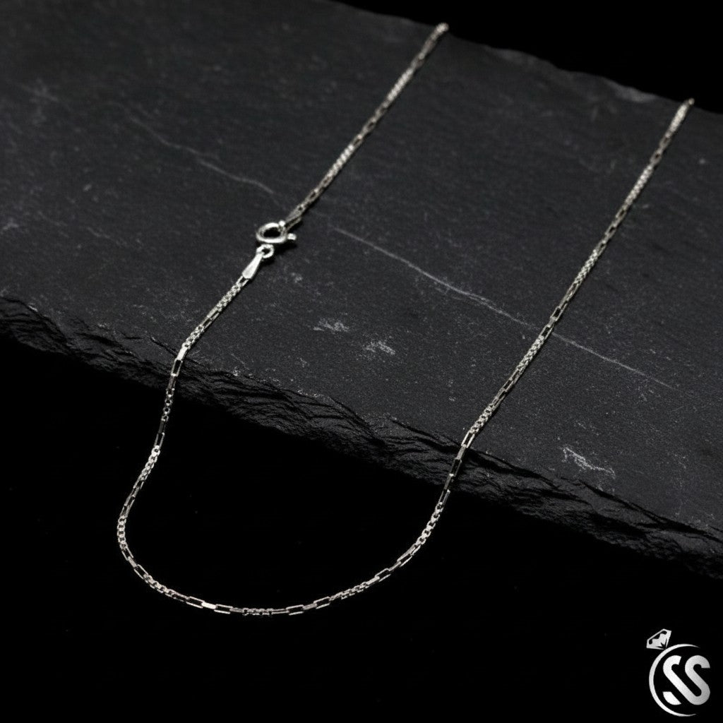 SilverStones.Pk 925 Italian sterling silver chain for ladies, delicate figaro link design with high-polish finish.