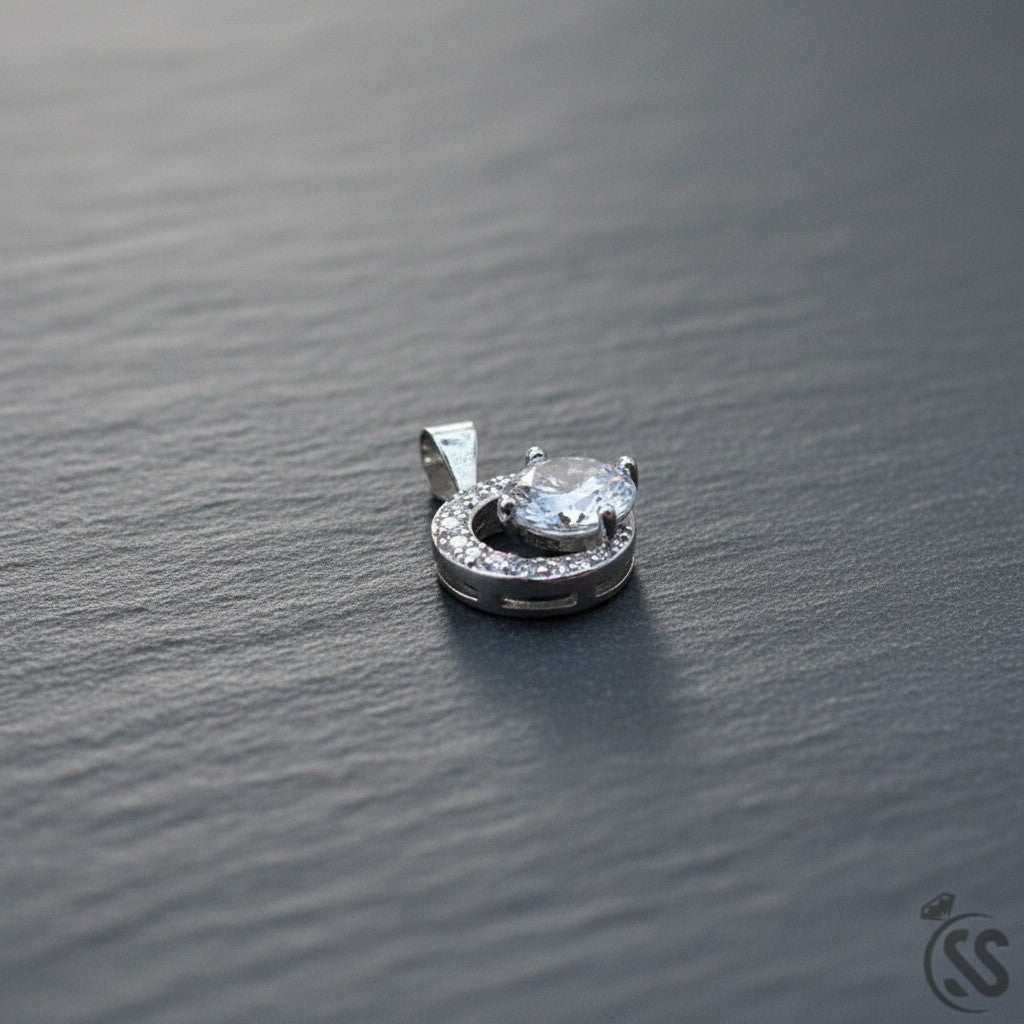 SilverStones.Pk Italian 925 sterling silver pendant with a central oval zircon stone surrounded by smaller stones. Rhodium plated.