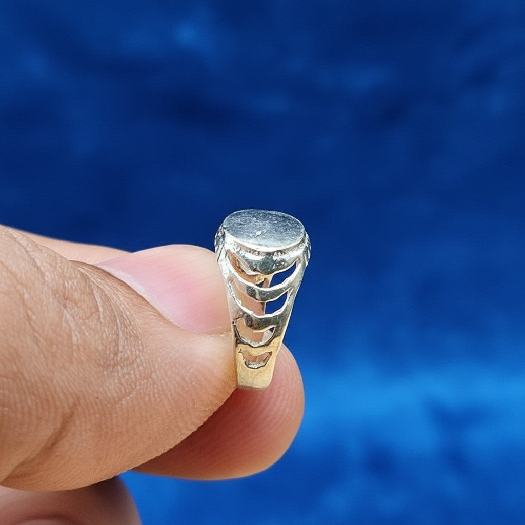 SilverStones.Pk 925 sterling silver ring for baby boy with oval top and cut-out band design.