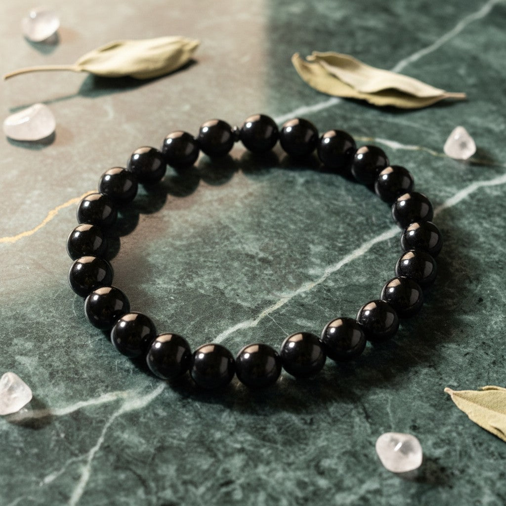 SilverStones.Pk black real aqeeq stone beaded bracelet. Round, polished stones with a subtle sheen.