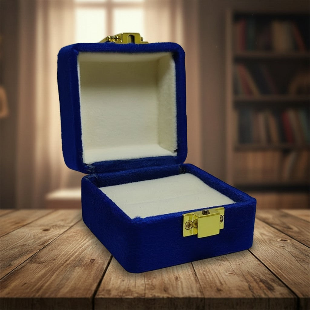 SilverStones.Pk blue velvet ring box with gold clasp and cream interior, perfect for proposals.