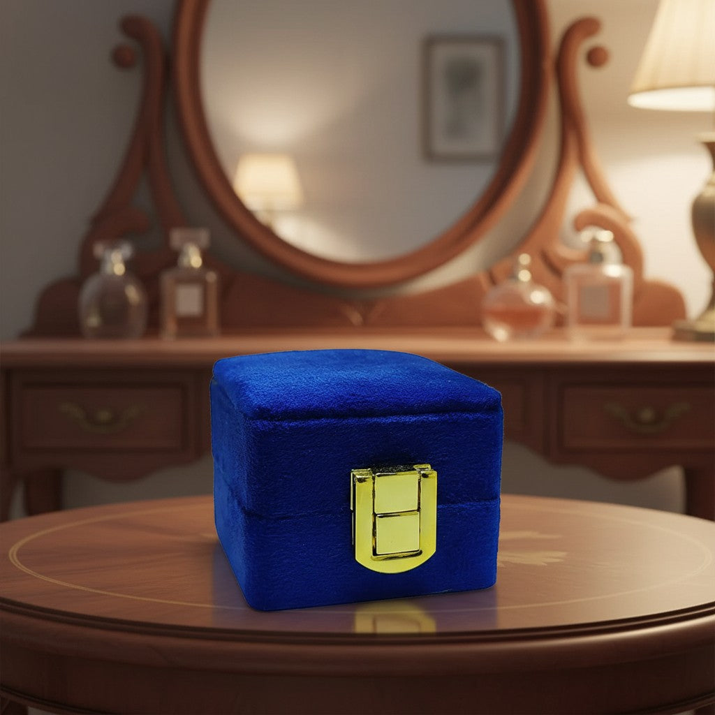 SilverStones.Pk royal blue velvet ring box with gold clasp, perfect for proposals and special occasions.