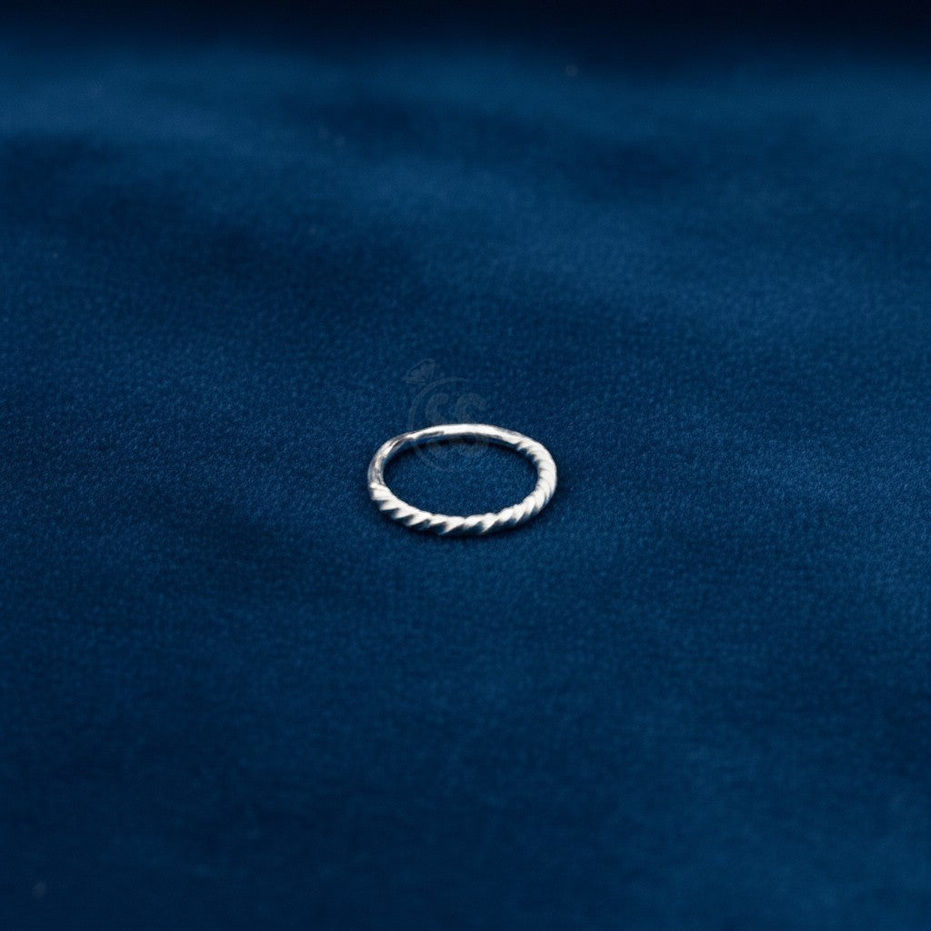 SilverStones.Pk Chandi nose ring, 8mm, pure silver with twisted design for a subtle sparkle.