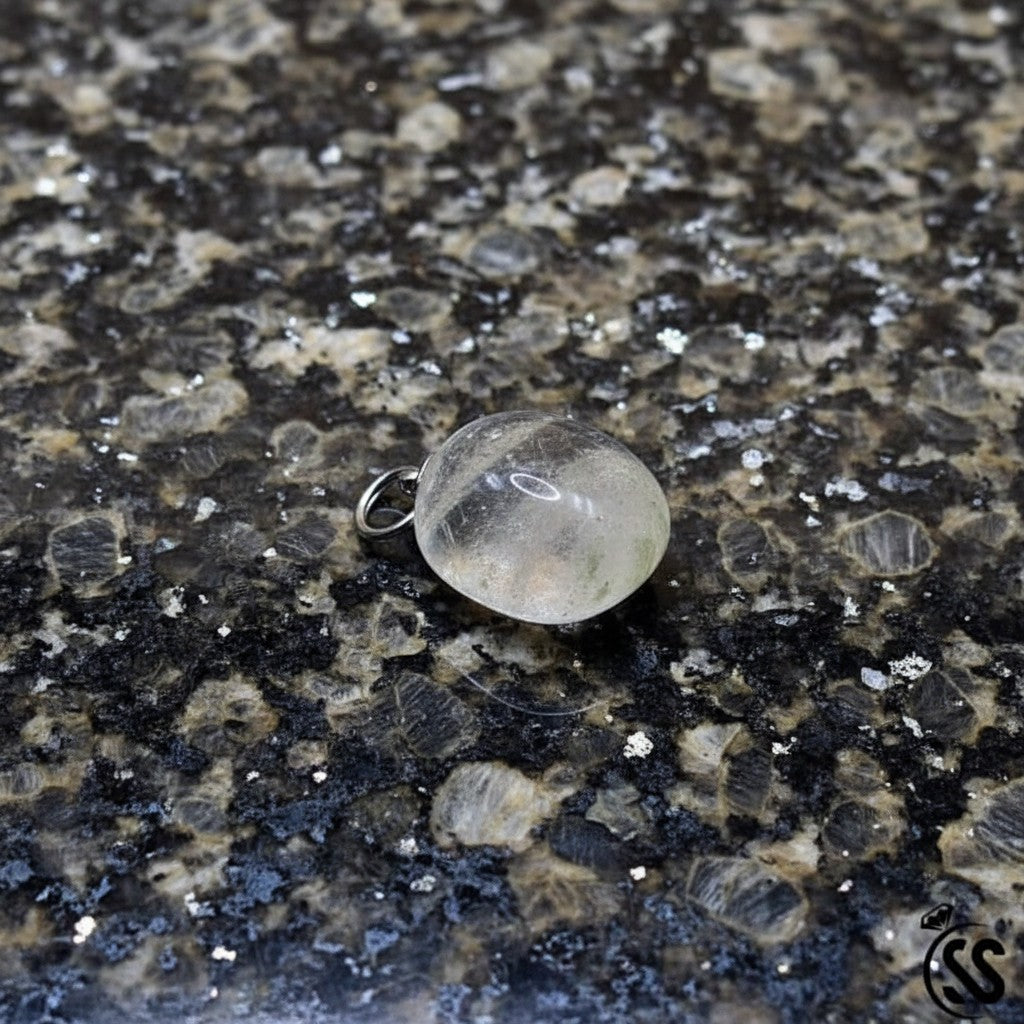 SilverStones.Pk clear quartz pendant, a natural, transparent white crystal with a polished finish and nickel-free metal hook.