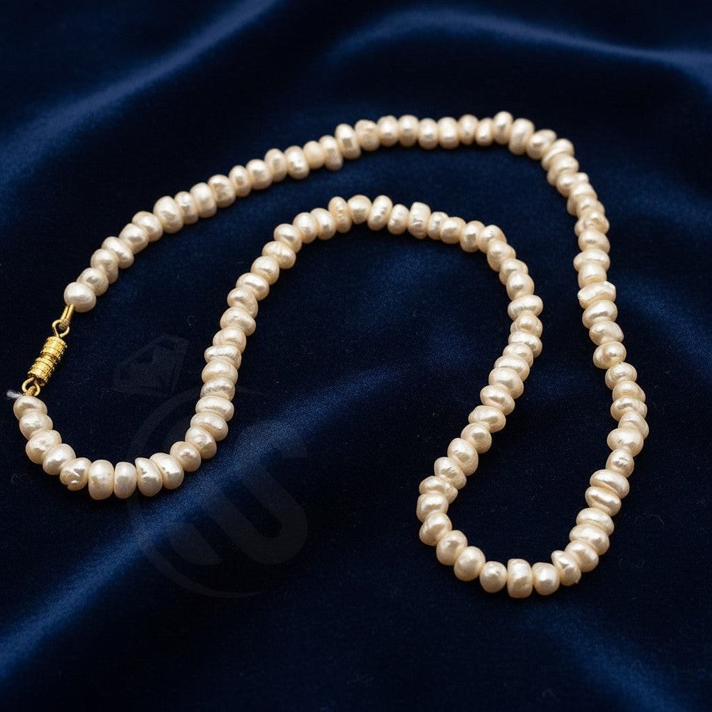 SilverStones.Pk cream freshwater pearl necklace with gold clasp. Classic, elegant design for ladies.