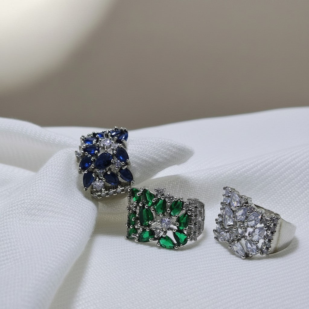 SilverStones.Pk designer ladies rings with blue, green, and clear zircon stones. Elegant, high-quality imitation jewelry.