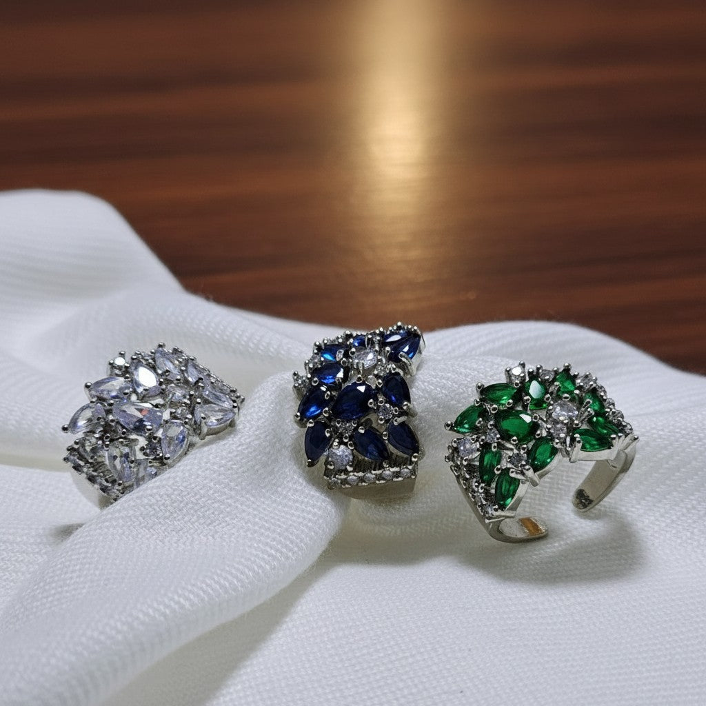 SilverStones.Pk designer ladies rings in silver with clear, blue, and green zircon stones. Elegant, sparkling, and ideal for special occasions.