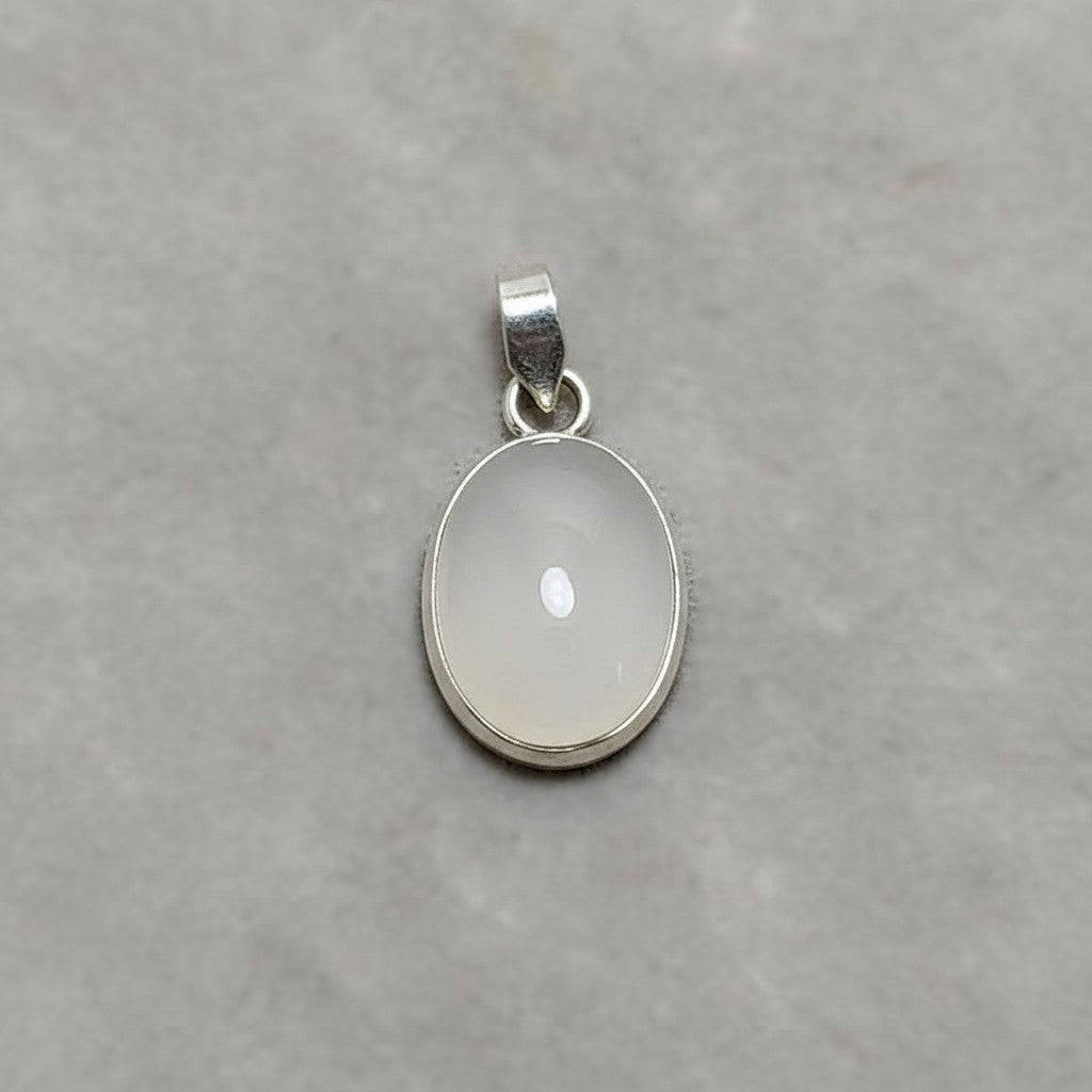 SilverStones.Pk oval Dur E Najaf gemstone pendant with a small white inclusion. Handmade silver chandi.