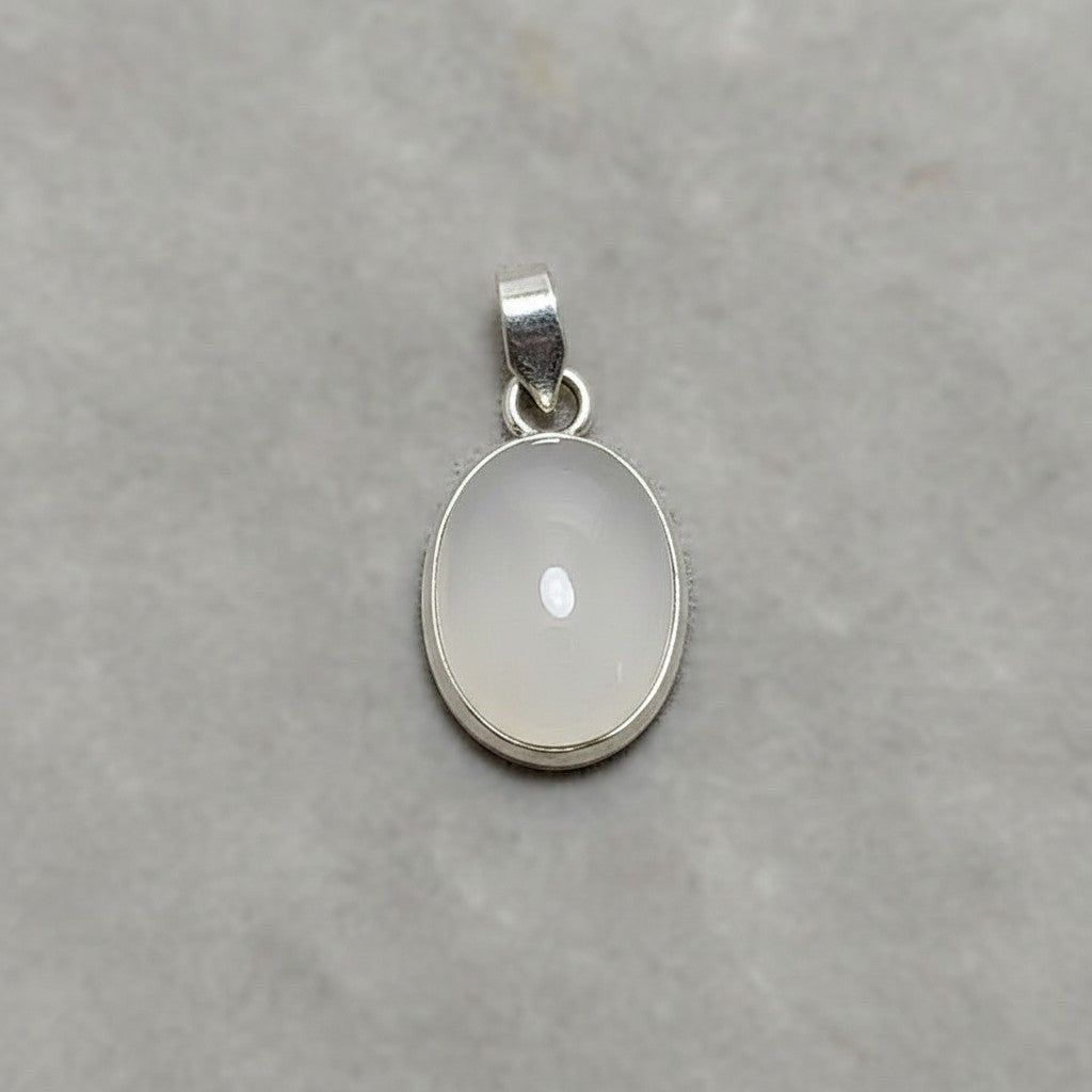 SilverStones.Pk oval Dur E Najaf gemstone pendant with a small white inclusion. Handmade silver chandi.