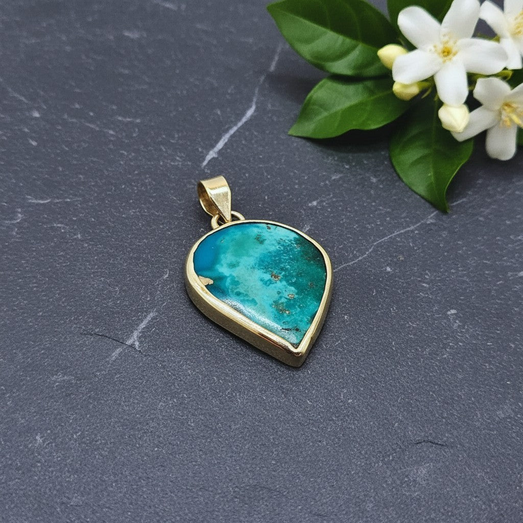 SilverStones.Pk handmade pendant with a teardrop-shaped real Feroza gemstone in shades of turquoise and blue, set in silver.