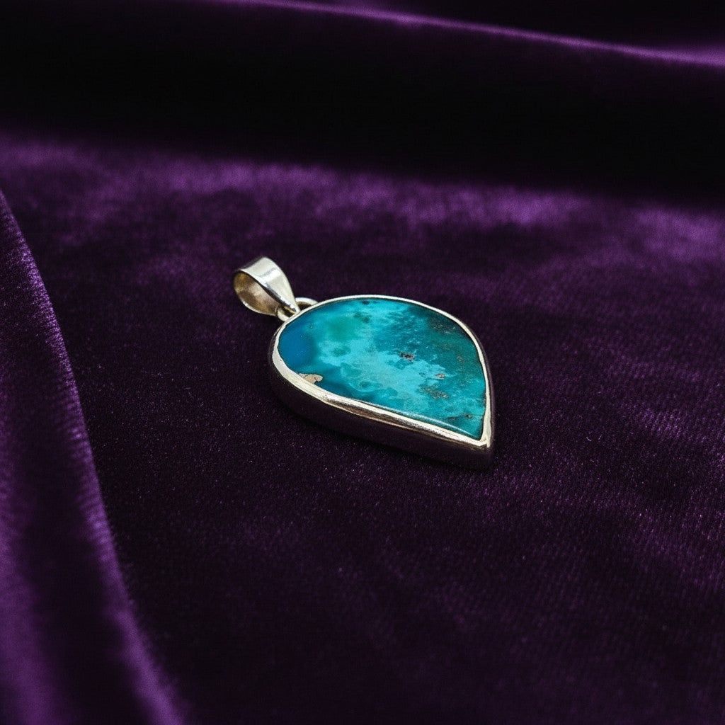 SilverStones.Pk handmade pendant featuring a teardrop-shaped Shajri irani feroza gemstone set in silver.