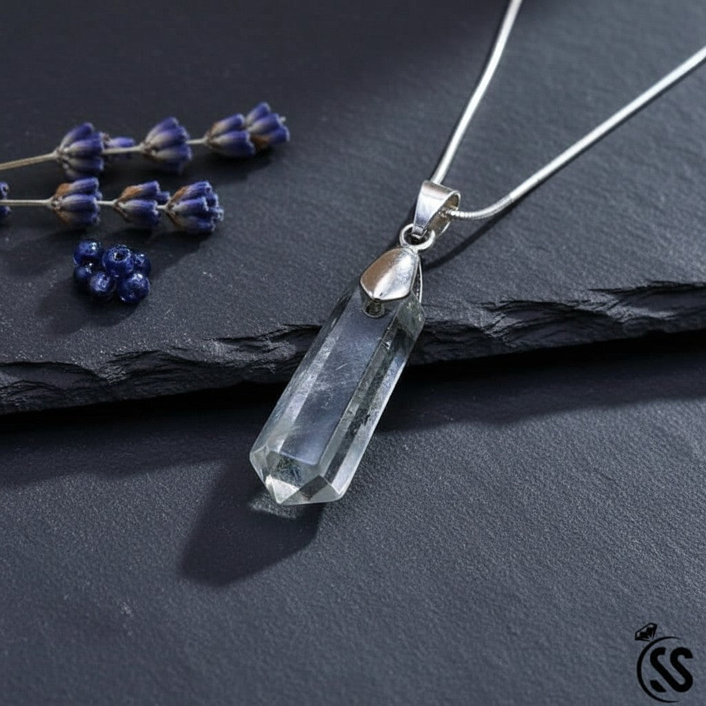 SilverStones.Pk clear and green fluorite crystal pendant with a silver-toned nickel-free hook. Natural stone for clarity and focus.