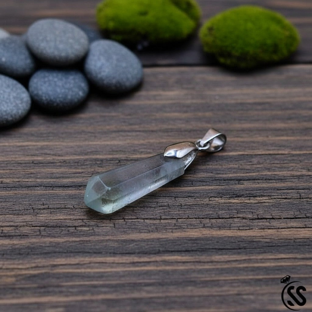 SilverStones.Pk multi-colored fluorite stone pendant with a clear, faceted crystal and nickel-free metal hook.
