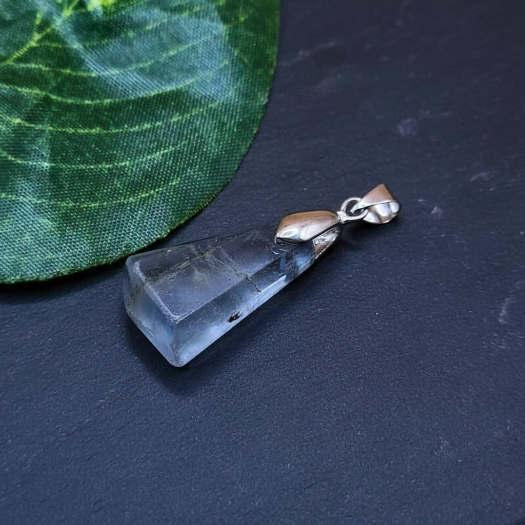 SilverStones.Pk multi-colored fluorite stone pendant with a nickel-free metal hook, promoting clarity and focus.